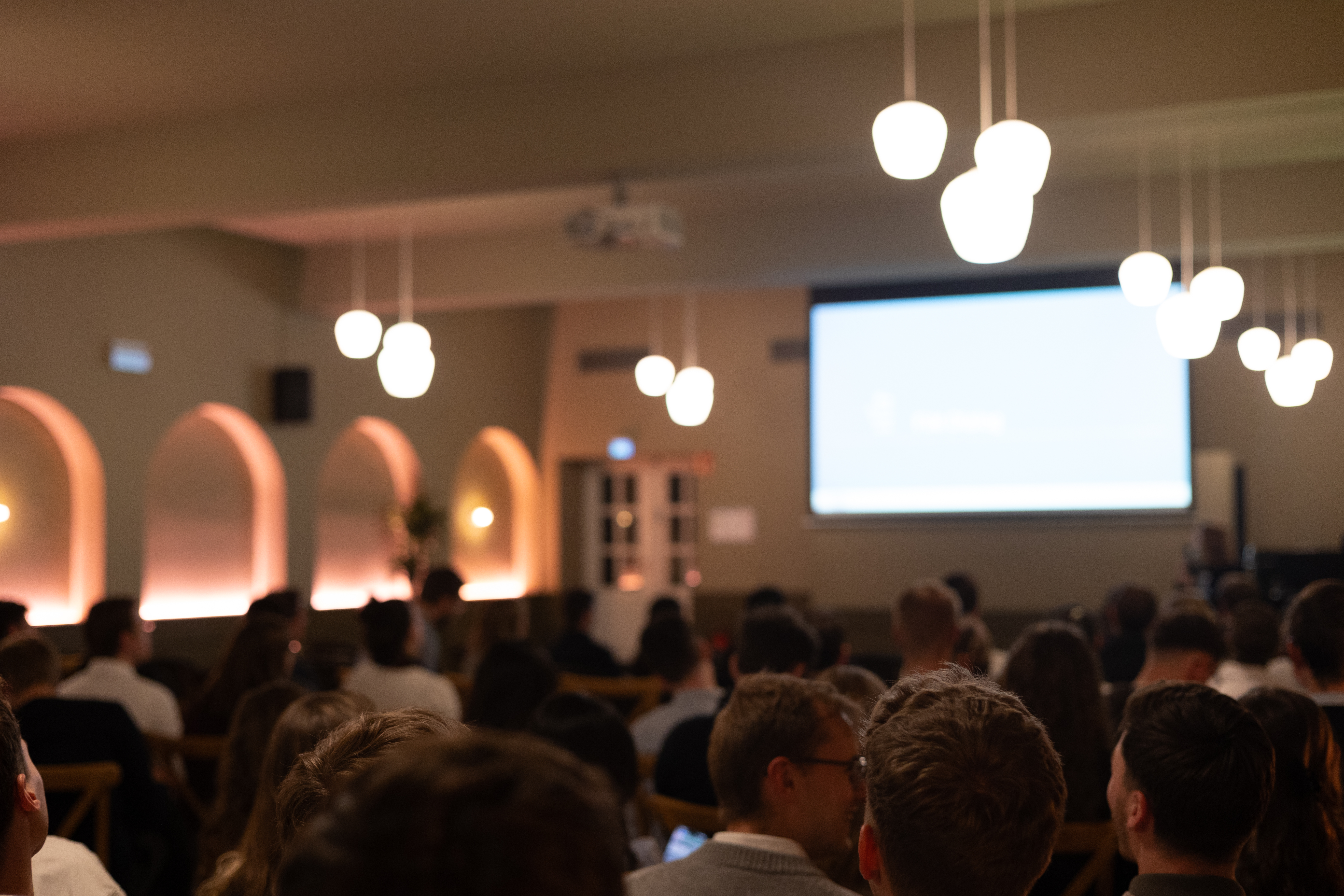 Board members of the FIM Alumni Association collaborating during a meeting